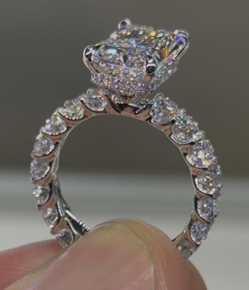 4 carat Radiant with 4mm Oval Brilliants Signature Hidden Halo