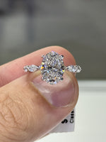 3.10 Carat Oval in Marquise & Round Ring Design