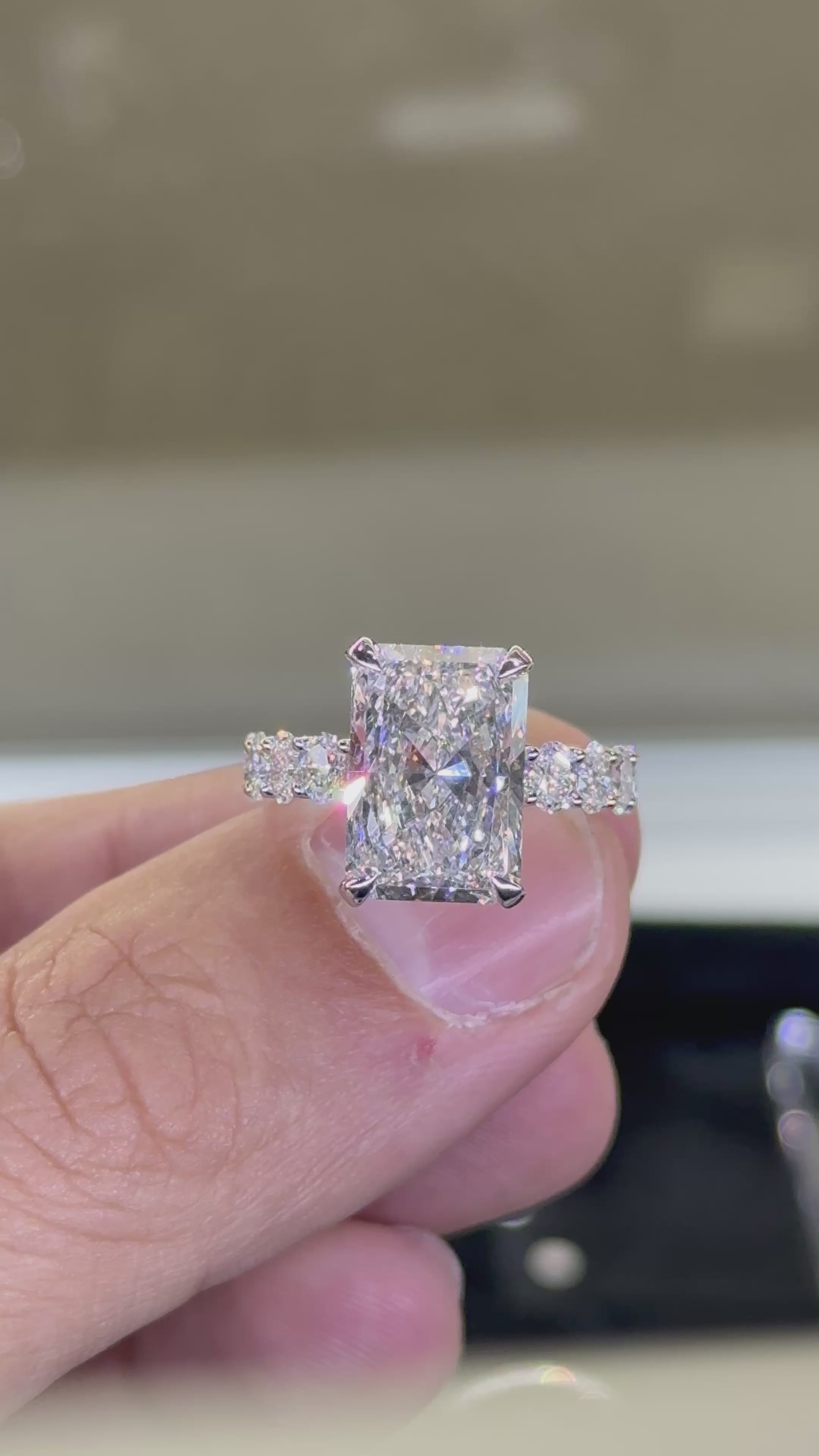 Radiant center with 4MM Oval Brilliant Sides